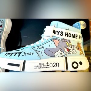 Tom and Jerry blue sneakers. New without tags or box.